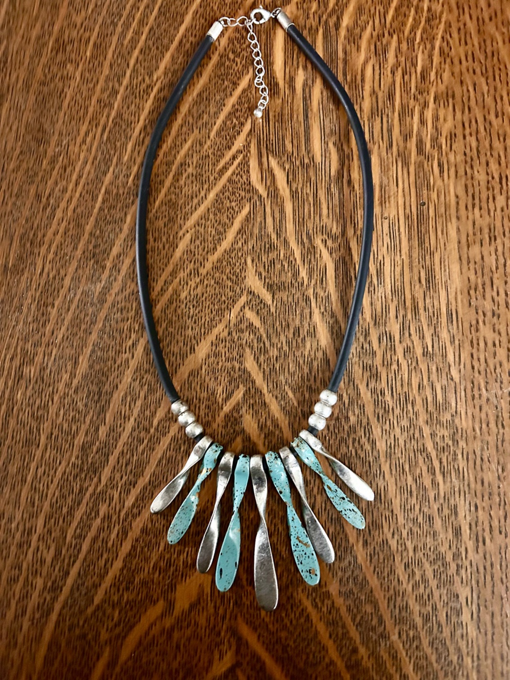 BlackWith Turquoise Toned Metal Accent Statement Necklace.